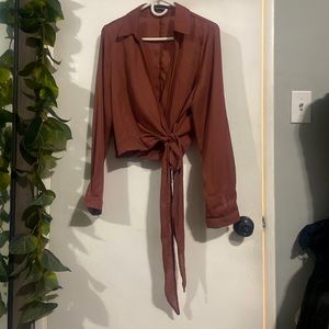 PrettyLittleThing brand. Long sleeve with a tie front detail. Copper/brown color